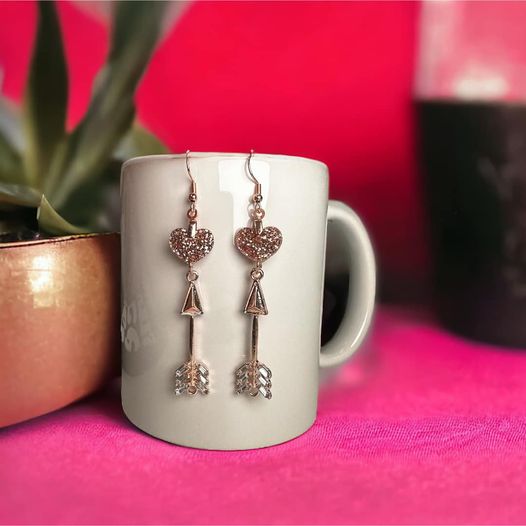 Rose gold heart and arrow charm earrings